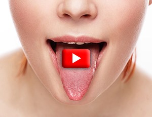 women with her tongue out and play button